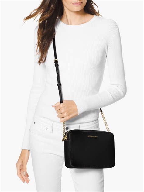 black and gold michael kors crossbody bag|Michael Kors small black crossbody.